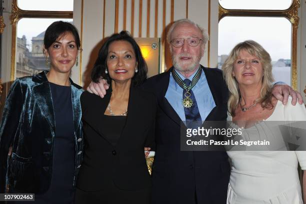 Actor Sir Michael Caine poses with daughters Natasha and Dominique and his wife Shakira after being awarded "Commandeur des arts et des lettres" by...