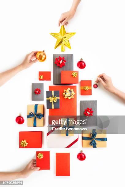 conceptual christmas tree decoration still life. - shopping flat lay stock pictures, royalty-free photos & images