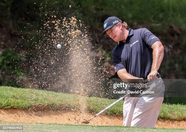 Ernie Els of South Africa plays his second shot on the par 3, eighth hole during the third round of the South African Open on the Firethorn Course at...