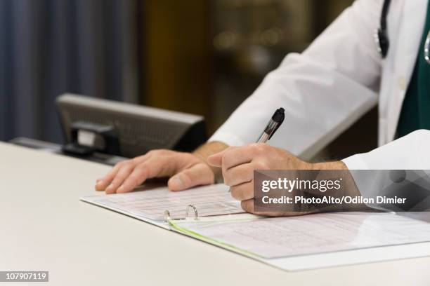 573 Completing Paperwork Stock Photos, High-Res Pictures, and Images ...
