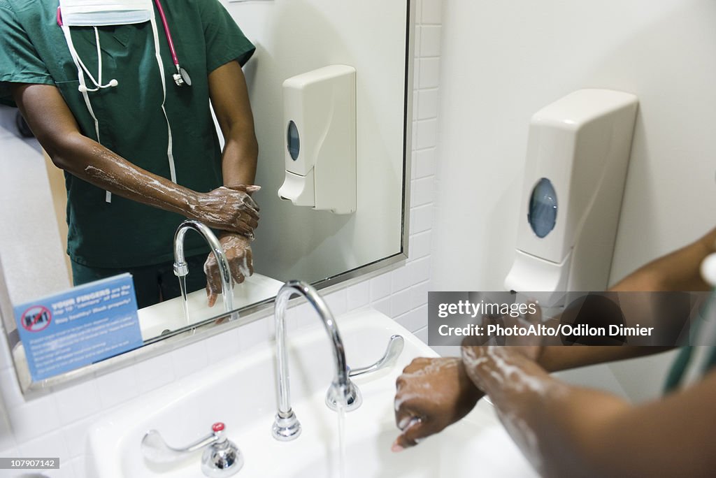 Healthcare worker washing hands