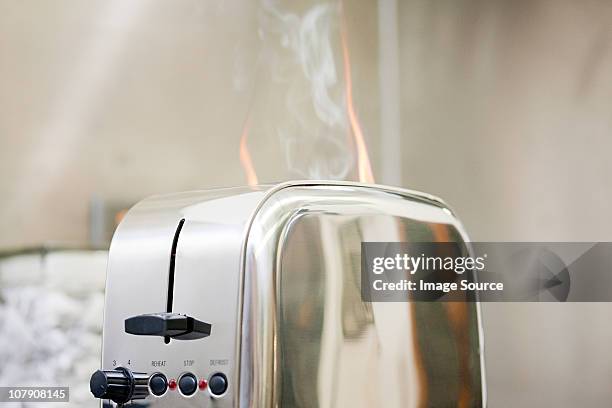 toaster on fire - dangers of smoking stock pictures, royalty-free photos & images