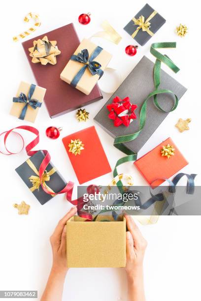 christmas day gift boxes still life. - holiday giving stock pictures, royalty-free photos & images