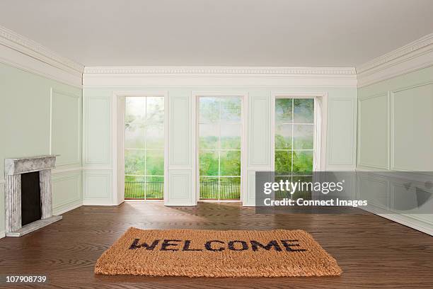 big welcome mat in tiny room - dolls house stock pictures, royalty-free photos & images