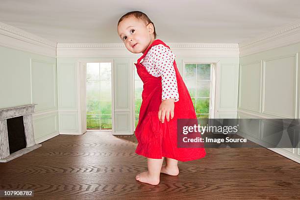 big toddler girl in a tiny room - miniature dollhouse bildbanksfoton och bilder