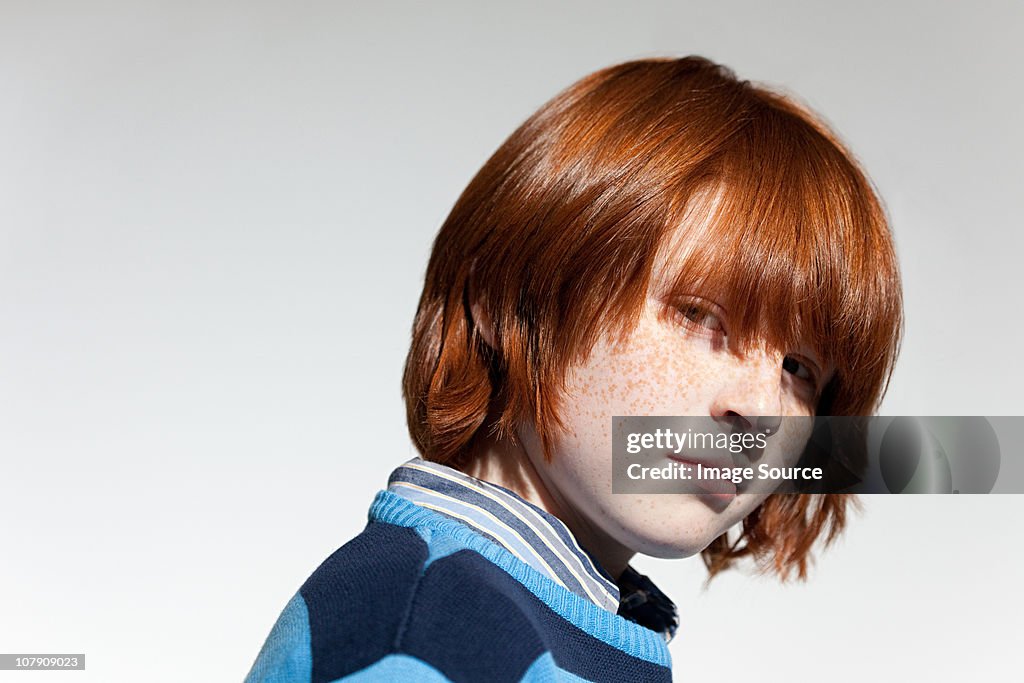 Portrait of boy with red hair