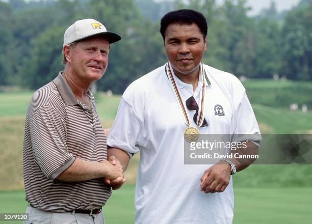 Jack Nicklaus meets Muhammad Ali during the US PGA Championship at Valhalla Golf Club in Lexington, Kentucky, USA. \ Mandatory Credit: David Cannon...