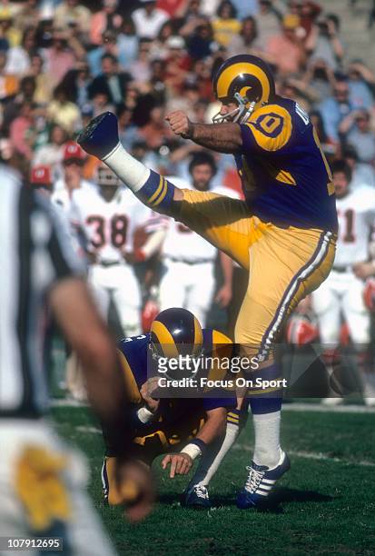 Kicker Tom Dempsey of the Los Angeles Rams kicks a field goal against the St. Louis Cardinals during an NFL football game at Los Angeles Memorial...