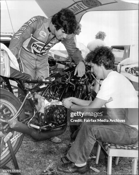 Mrs Moyne Boulden re-building her son, Ron’s Yamaha 250 cc engine prior to his practice round, Mrs Boulden has been doing the mechanical work on...