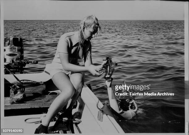 Kathy Troutt established an unofficial world diving record for women of 320 feet. May 23, 1965. .