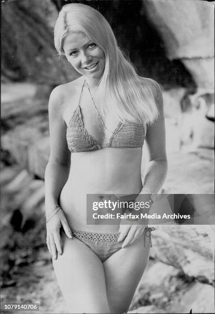 Today's weather girls is Kathy Troutt of Gymea. Kathy is a model and was pictured at Mrs MacQuarie's Chair. January 24, 1974. .