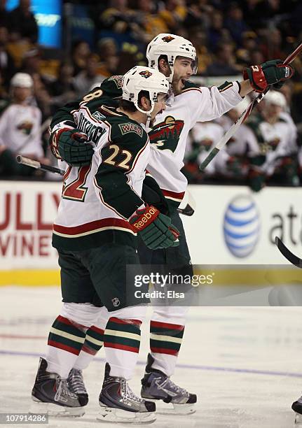 Brent Burns and Cal Clutterbuck of the Minnesota Wild celebrate a goal in the third period against the Boston Bruins on January 6, 2010 at the TD...