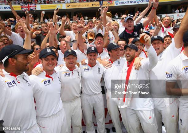The England team celebrate a 3-1 ashes victory with the Barmy Army during day fiveof the Fifth Ashes Test match between Australia and England at...