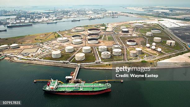 tank farm at petrochemical refinery, singapore - oil tanker stock-fotos und bilder