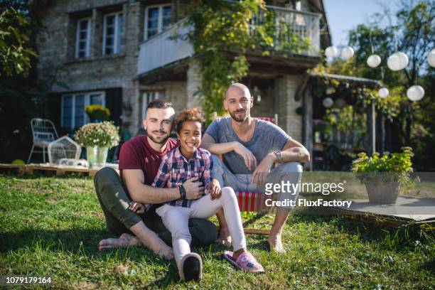 Serene gay family with a adopted daughter