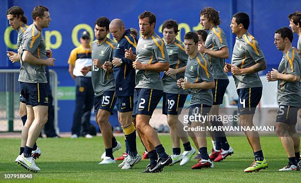 CAPTIONLucas Neill , the captain of the Australian national football team, joins teammates in a session at Al-Wakra stadium in Doha on January 07...