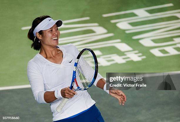 Li Na of China smiles during her match against Venus Williams of USA on day three of the Hong Kong Tennis Classic 2011 at the Victoria stadium on...