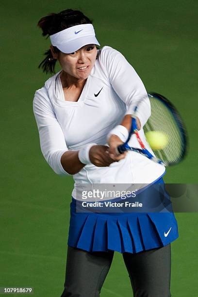 Li Na of China in action during her match against Venus Williams of USA on day three of the Hong Kong Tennis Classic 2011 at the Victoria stadium on...