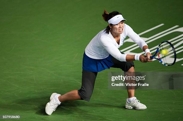 Li Na of China in action during her match against Venus Williams of USA on day three of the Hong Kong Tennis Classic 2011 at the Victoria stadium on...