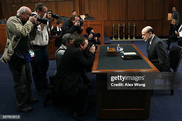 Federal Reserve Board Chairman Ben Bernanke arrives for a hearing before the Senate Budget Committee January 7, 2011 on Capitol Hill in Washington,...