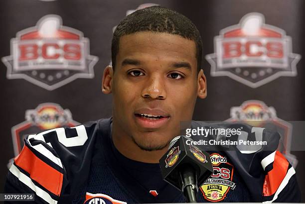 Quarterback Cam Newton of the Auburn Tigers speaks during Media Day for the Tostitos BCS National Championship Game at the JW Marriott Camelback Inn...