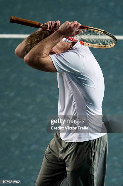 John McEnroe of the United States reacts on his match against Mark Philippoussis of Australia during day three of the Hong Kong Tennis Classic 2011...