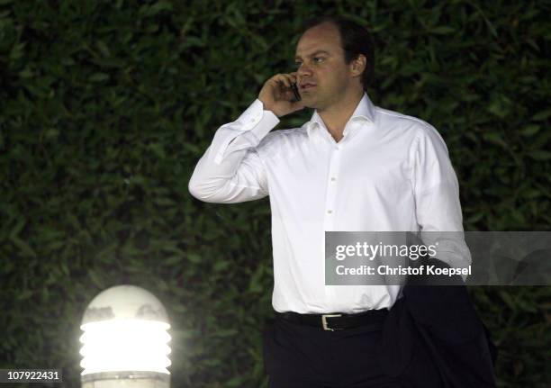 Manager Christian Nerlinger of Bayern speaks on his mobile during the FC Bayern Muenchen training session at Aspire Academy for Sports Excellence...