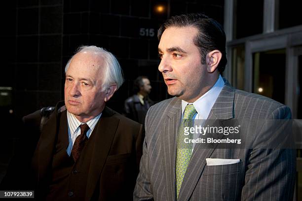 Public defenders Robert Scardino, left, and Ali Fazel speak to the media outside of the Bob Casey Federal Courthouse after a hearing for their...