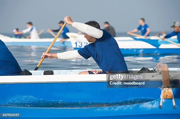 outrigger canoeing teams compete - row racing stock pictures, royalty-free photos & images