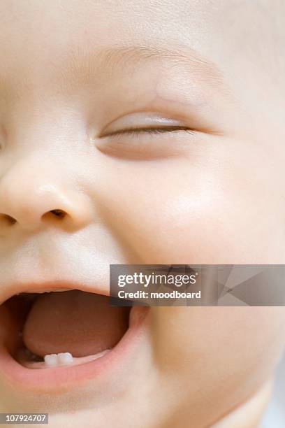 infant child laughing with milk teeth - baby tooth stock pictures, royalty-free photos & images