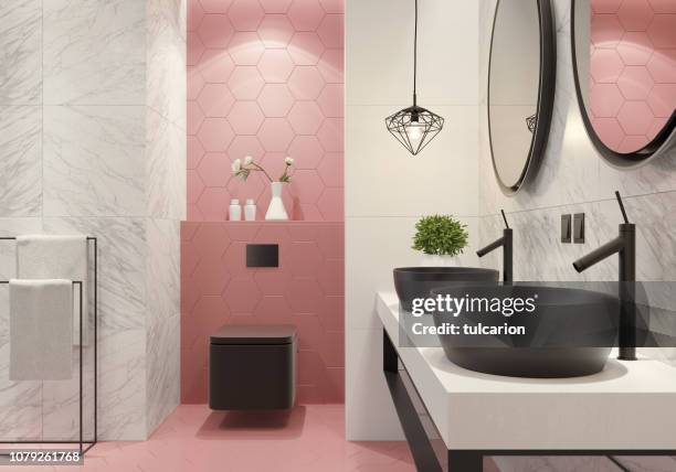 contemporary bathroom with light pink honeycomb tiles - pink color block stock pictures, royalty-free photos & images