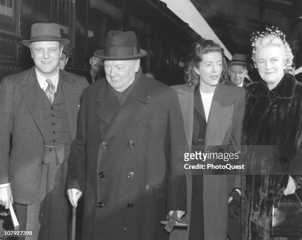 British Prime Minister Winston Churchill and his wife, Clementine Churchill, Baroness Spencer-Churchill , along with two of their children,...