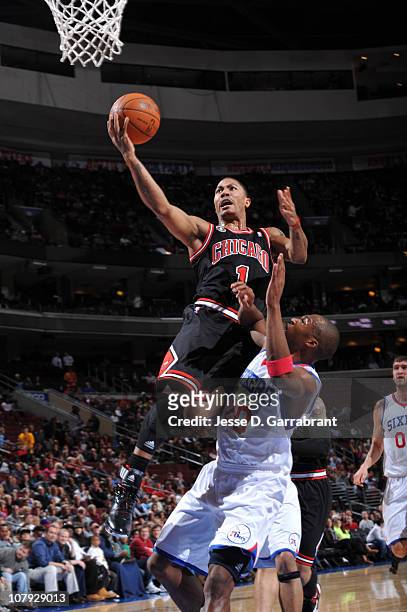 Derrick Rose of the Chicago Bulls shoots against Jodie Meeks of the Philadelphia 76ers during the game on January 7, 2011 at the Wells Fargo Center...