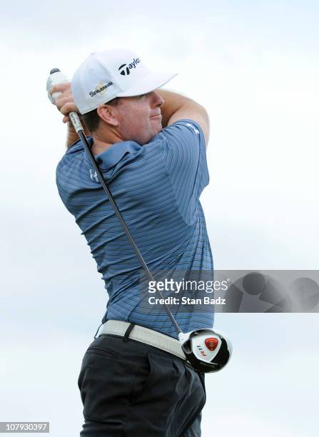 Robert Garrigus hits a drive during the second round of the Hyundai Tournament of Champions at Plantation Course at Kapalua on January 7, 2011 in...