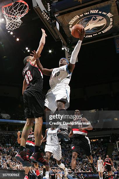 Jonny Flynn of the Minnesota Timberwolves shoots against Nicolas Batum of the Portland Trail Blazers during the game on January 7, 2011 at Target...