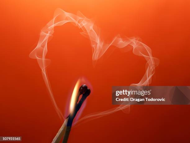 hot heart - smoke heart stock pictures, royalty-free photos & images