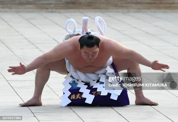 Yokozuna" or sumo grand champion Hakuho of Mongolia takes part in a traditional ring-entering ceremony at Meiji shrine in Tokyo on January 8, 2019.