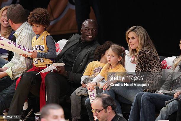 Henry Samuel, Seal, Leni Samuel, and Heidi Klum attend a game between the New Orleans Hornets and the Los Angeles Lakers at Staples Center on January...