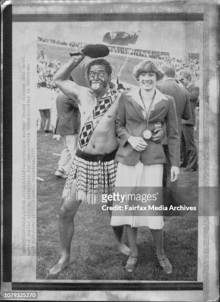 Australian swimmer Tracey Wickham with Maori Warrior during closing ceremonies for Commonwealth Games Saturday in Edmonton. August 12, 1978. .
