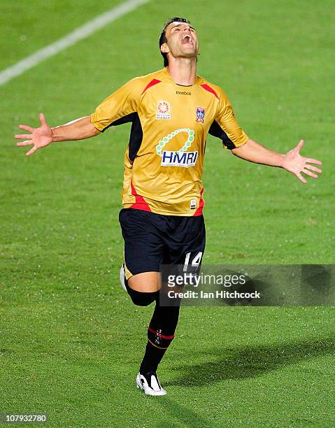 Labinot Haliti of the Jets celebrates after scoring the Jets second goal during the round 22 A-League match between the North Queensland Fury and the...