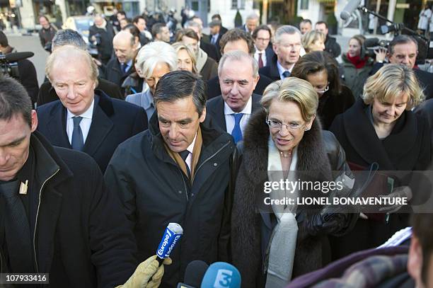 Members of the French government led by Prime Minister Francois Fillon and Foreign Affairs Minister Michele Alliot-Marie speak to the press as they...