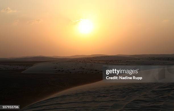 View of the Inland Sea area where a salt water bay for about 20 kilometers is sourrounded by desert on December 27, 2010 in Khor al Udaid, Qatar. The...