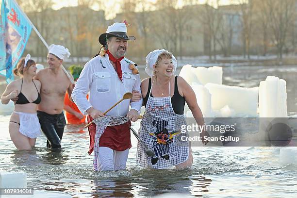 Ice swimming enthusiasts take to the frigid waters of Orankesee lake during the 27th annual "Winter Swimming in Berlin" on January 8, 2011 in Berlin,...
