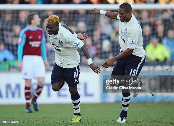 Louis Saha of Everton celebrates after scoring the opening goal with team-mate Sylvain Distin during the FA Cup sponsored by Eon 3rd round match...