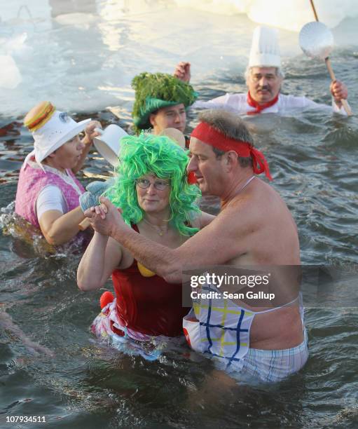 Ice swimming enthusiasts take to the frigid waters of Orankesee lake during the 27th annual "Winter Swimming in Berlin," which this year had a...