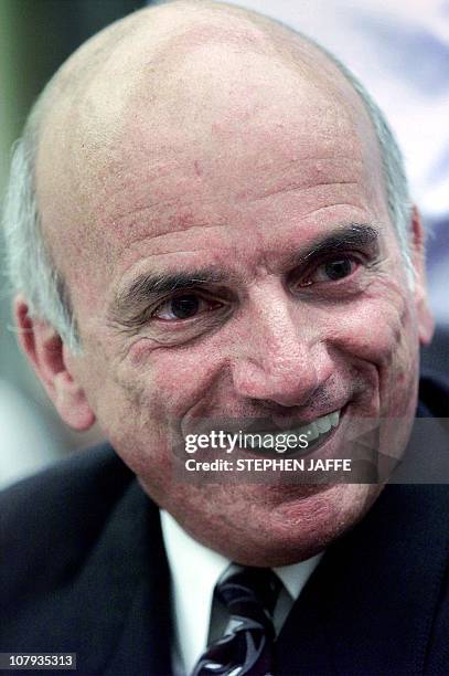 Businessman Dennis Tito laughs prior to testifying at the House Space and Aeronautics Subcommittee on Capitol Hill 26 June, 2001. The Subcommittee...