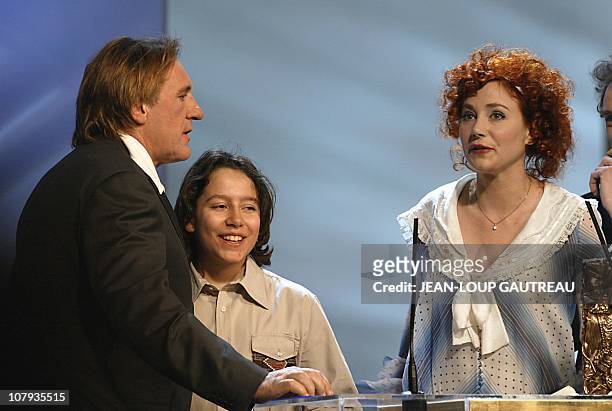 French actor Gerard Depardieu speaks next to French young actor Antoine Pialat after his daughter Julie Depardieu was awarded as Best Female Newcomer...