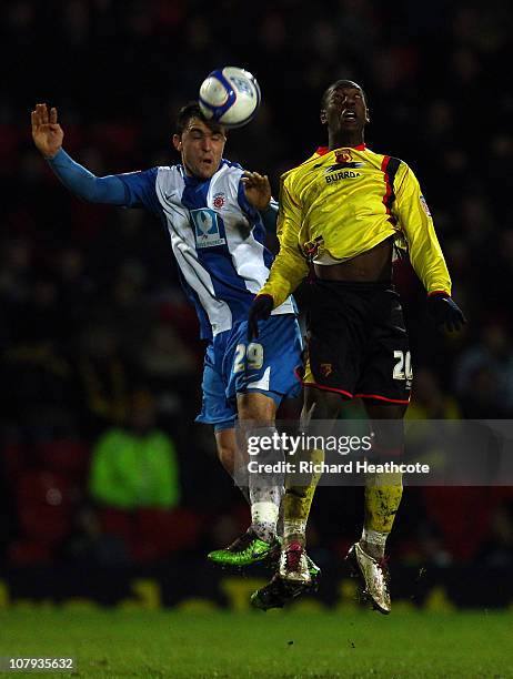 Marvin Sordell of Watford goes up for a header with Peter Hartley of Hartlepool during the 3rd round FA Cup Sponsored by E.ON match between Watford...