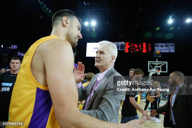 Head Coach Andrew Gaze of the Kings celebrates with Andrew Bogut after winning the round eight NBL match between the New Zealand Breakers and the...