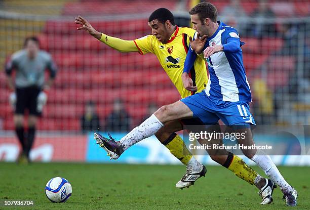 Andy Monkhouse of Hartlepool battles with Troy Deeney of Watford during the 3rd round FA Cup Sponsored by E.ON match between Watford and Hartlepool...